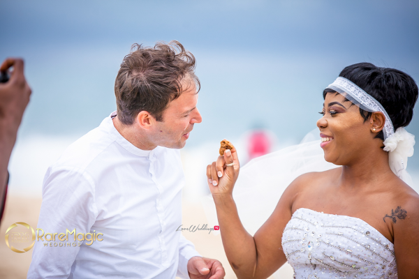 nigerian-italian-beach-wedding-feeding-cake-irene-adams-luca-tomasi-raremagic-gallery-loveweddingsng-2