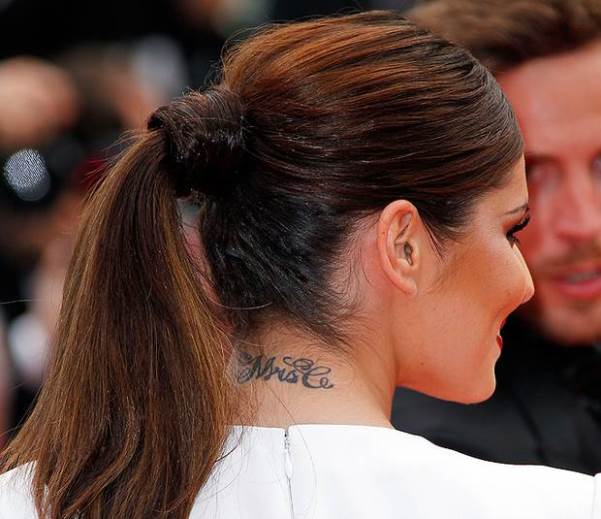 Cheryl Cole Defends English Roses Tattoo