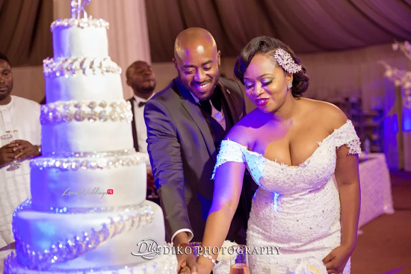 Nigerian Couple cutting the cake Judith & Kingsley Diko Photography LoveweddingsNG