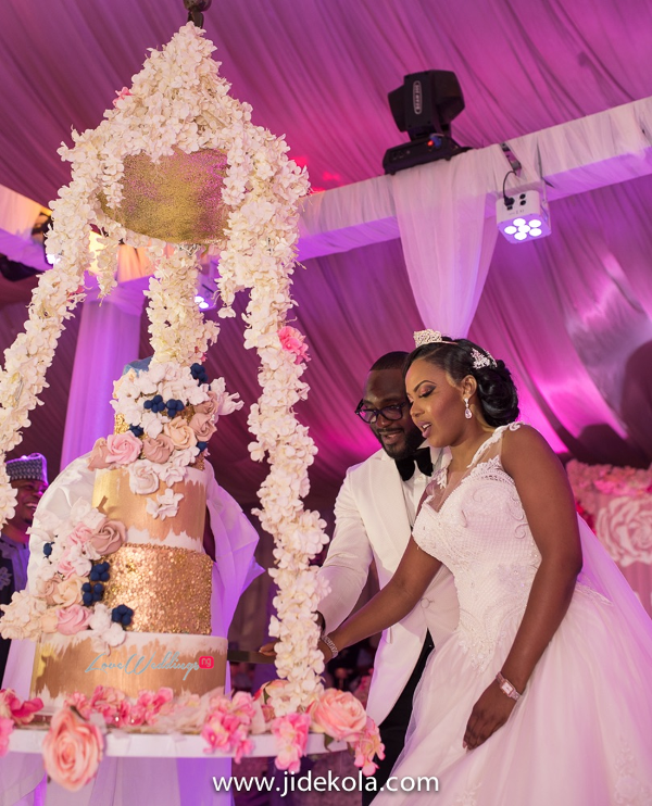 Nigerian Couple Cutting the Wedding Cake - Prince Kasali and Olori Abisoye Jide Kola LoveWeddingsNG