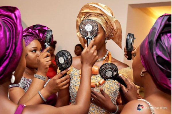 The portable rechargeable hand fan is the Nigerian bride’s latest accessory